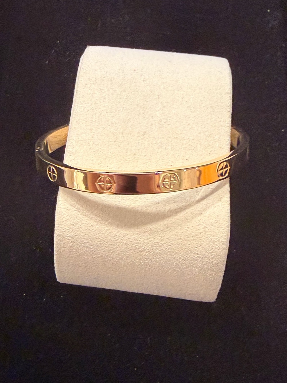 Gold Tone Bangle Bracelet with Embossed Circle Motifs